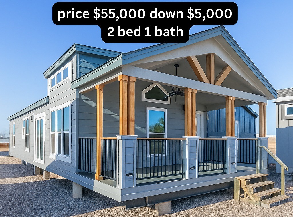 A modern gray tiny house with a wooden porch and steps. Text overlay: “Price $55,000, down $5,000, 2 bed 1 bath.” Bright, clear day, inviting.