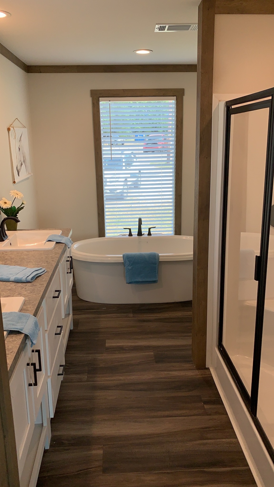 Comprehensive luxury modular home collection featuring the APH 1662C 819 SQ FT floor plan, navy blue and white farmhouse exteriors, gourmet kitchens with quartz waterfall islands, hidden arched pantries, industrial corrugated metal accents, stone fireplaces, and vaulted tiny home lofts with sliding barn doors.