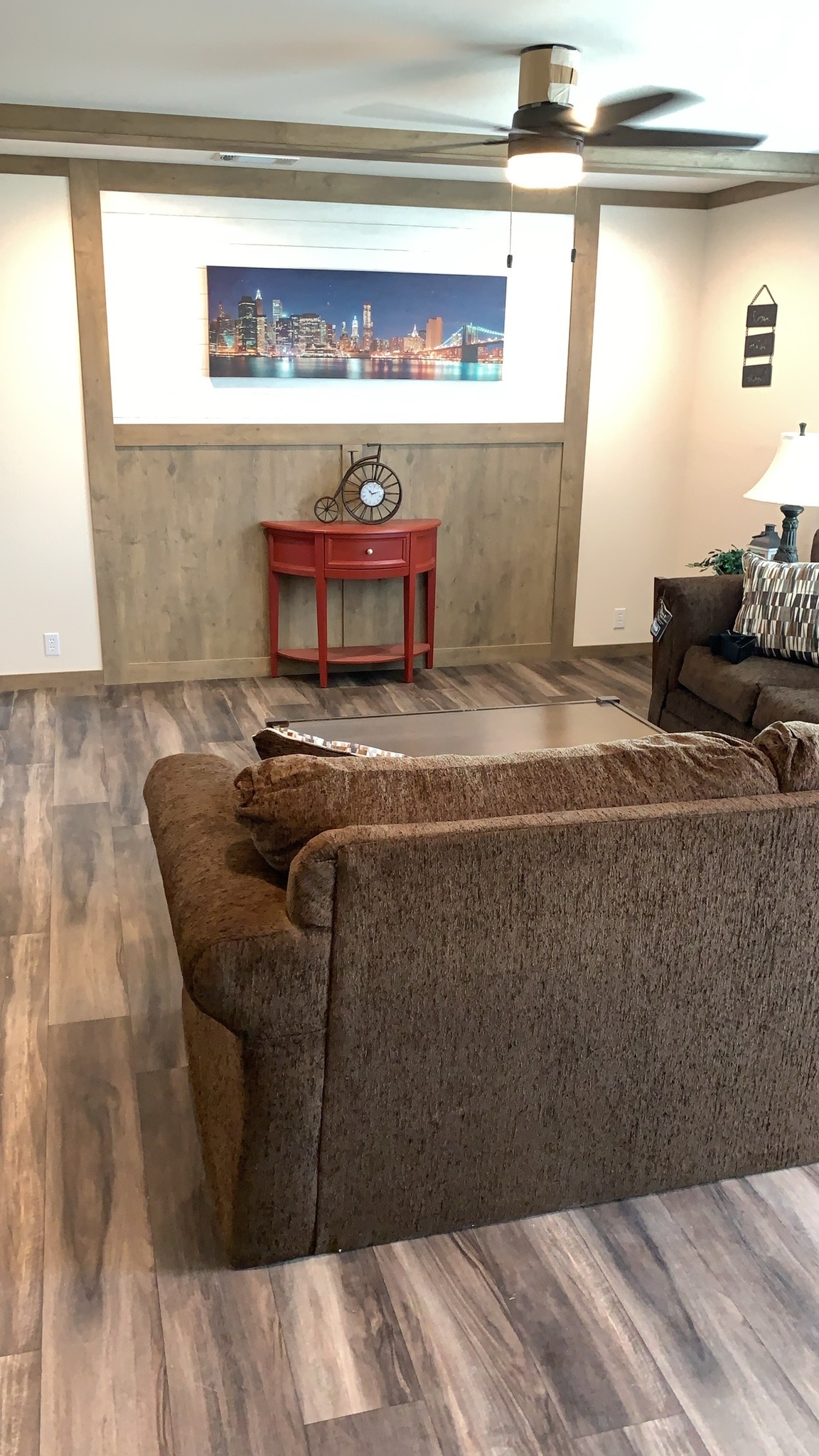 Comprehensive luxury modular home showcase featuring the APH 1662C 819 SQ FT floor plan, navy blue and grey farmhouse exteriors, and modern interiors with quartz waterfall islands, hidden arched pantries, industrial corrugated metal kitchen accents, stone fireplaces, and vaulted tiny home lofts with sliding barn doors.