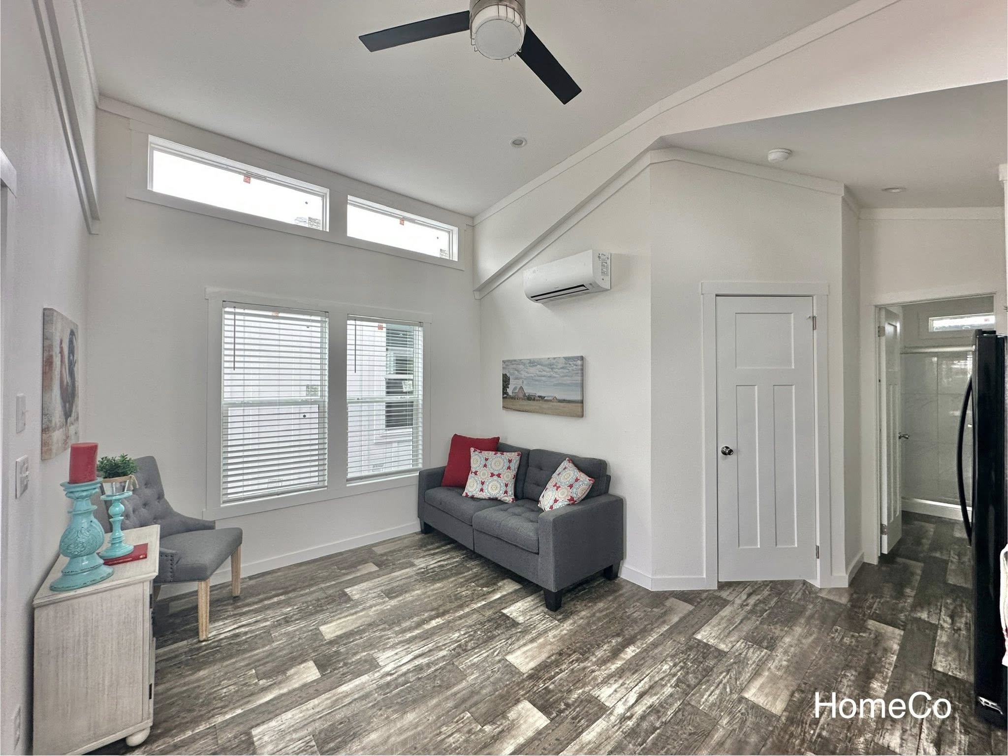 High-ranking SEO-optimized gallery of luxury tiny houses and modern manufactured homes, featuring a navy blue park model with a screened porch and rustic wood trim, a light blue beach cottage with a vaulted white shiplap interior and gourmet kitchen, and a large white ranch-style modular home with brick skirting; the collection highlights premium mobile living, innovative small-space architectural design, and contemporary interior decor featuring vaulted ceilings, LED-accented tray ceilings, stainless steel appliances, and stylish living areas with green velvet seating for maximum search visibility.