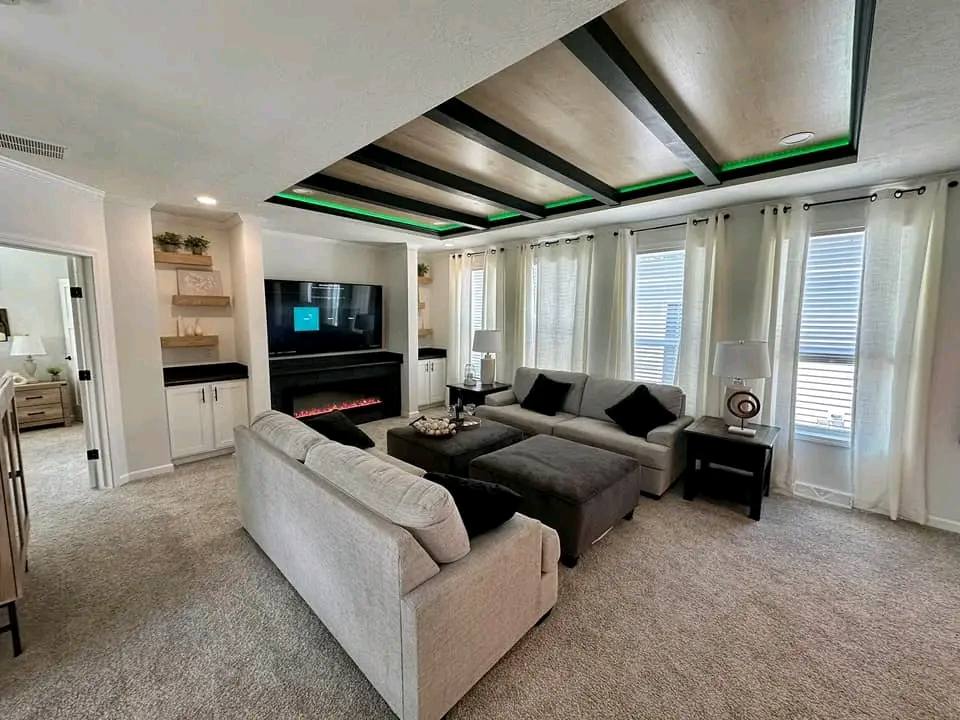 High-ranking SEO-optimized gallery showcasing luxury tiny houses and modern manufactured homes, featuring a navy blue park model with a spacious screened porch, a light blue beach cottage with a white shiplap interior and gourmet kitchen, and a large white ranch-style modular home with brick skirting; the collection highlights premium mobile living, innovative small-space architectural design, and contemporary interior decor featuring vaulted ceilings, LED-accented tray ceilings, stainless steel appliances, and stylish living areas for maximum search visibility.