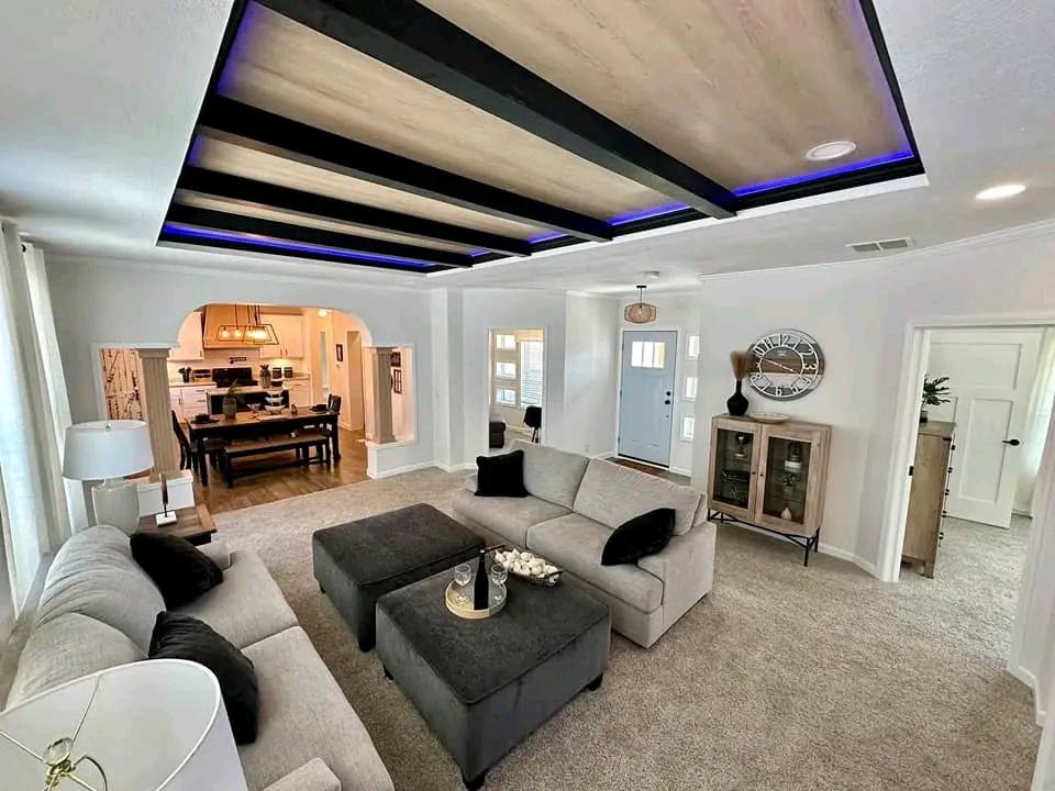 SEO-optimized gallery showcasing a variety of luxury tiny houses and modern modular homes, including a navy blue park model with a screened porch, a light blue beach cottage with a white shiplap interior and gourmet kitchen, and a spacious white ranch-style manufactured home with a brick foundation; the collection highlights premium mobile living, innovative small-space architectural design, and contemporary interior decor featuring vaulted ceilings, stainless steel appliances, and stylish living areas for maximum search visibility.