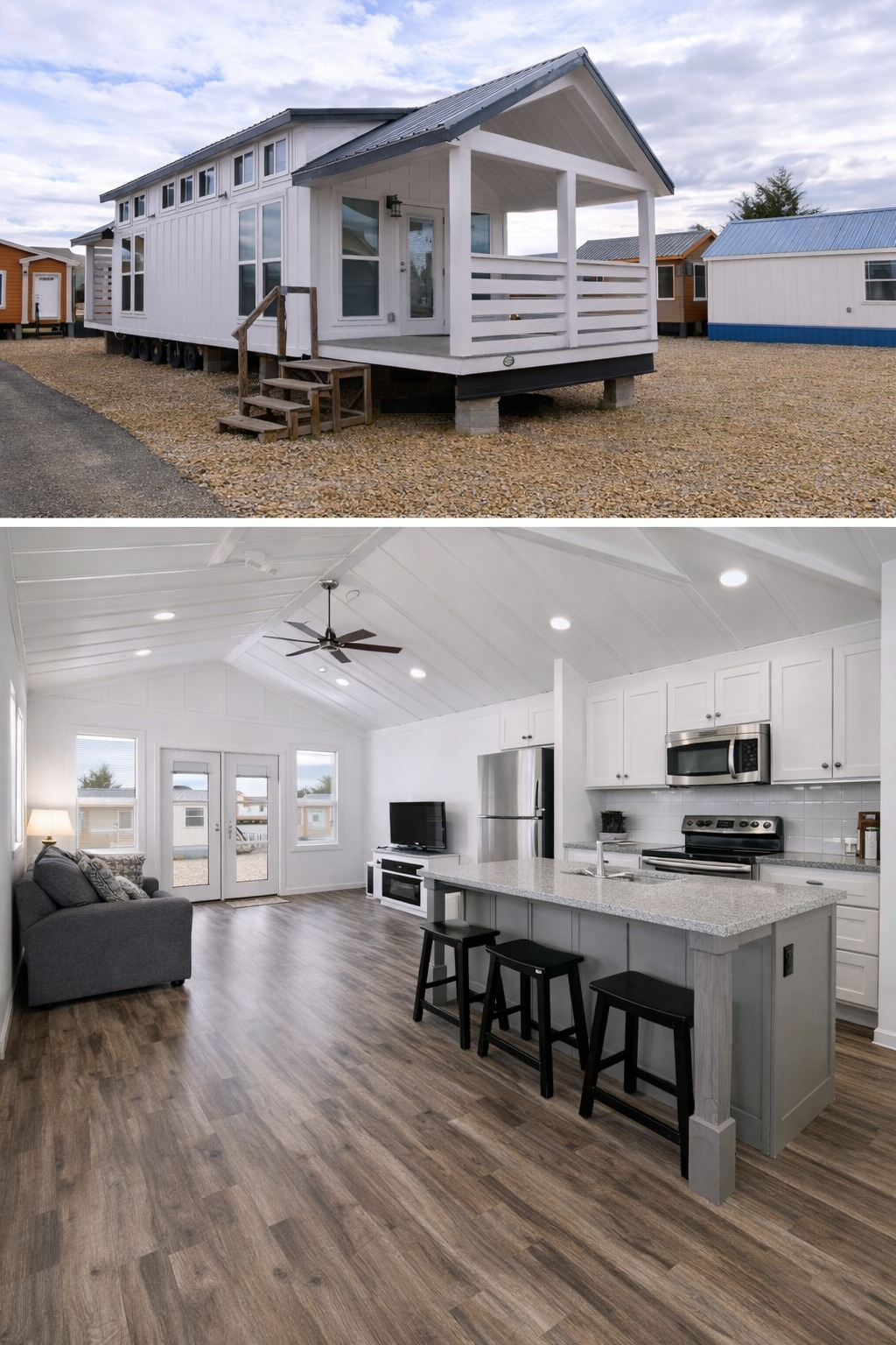 Luxurious modern farmhouse tiny home exterior on concrete piers with white board and batten siding, dark metal gable roof, expansive wrap-around covered porch with white railings and wooden steps, large energy-efficient windows flooding natural light, open-concept interior showcasing vaulted shiplap ceilings with ceiling fan, bright white shaker kitchen cabinets, large gray quartz island, stainless steel appliances, gray wood-look plank flooring, cozy gray sofa, black bar stools, spacious living area in recreational resort cottage style – ultimate tiny house design inspiration for minimalist living and vacation homes.